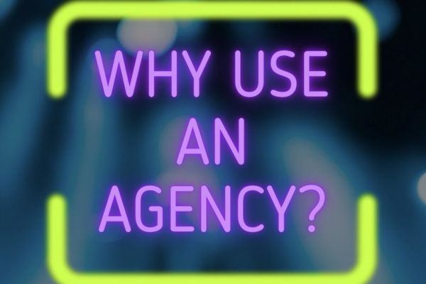 A promotional graphic with a blurred background of a concert or event scene, featuring silhouettes of people raising their hands under bright stage lights. The text 'WHY USE AN AGENCY?' is displayed in bold neon purple letters inside a neon yellow rectangular frame. Below, the logo for 'The Entertainment Fixers' is featured, consisting of a stylized 'EF' symbol with a small star, followed by the company's name in modern, sleek typography.